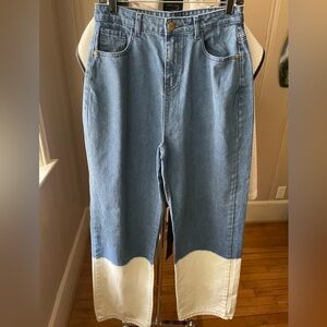 High-waisted, wide leg jeans with bleached ends